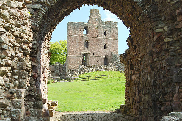 Norham Castle and tower through the entrance gate stock photo