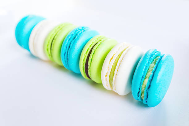 Sweet and colorful french macaroons or macaron on white backgrou