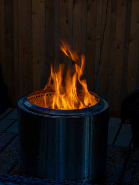 istock Outdoor gas fire pit on cabin porch 1558510954