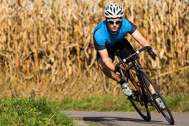 cyclist athlete on a bicycle racing bicycle photos stock pictures, royalty-free photos & images