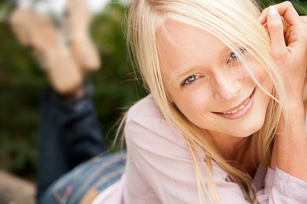 istock Young and smiling woman 155855589