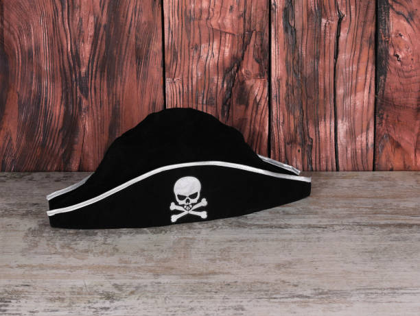 istock pirate hat on wooden table 1558560272