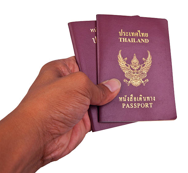 istock hand and passport isolated white 155856219