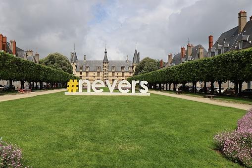 Logo of Nevers in the form of a Hashtag in front of the palace of the Dukes of Burgundy, city of Nevers, department of Nièvre, France