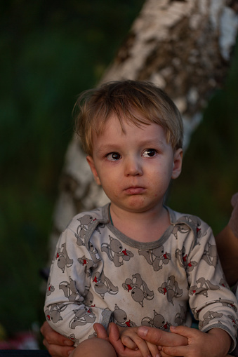 A little boy with tearful eyes