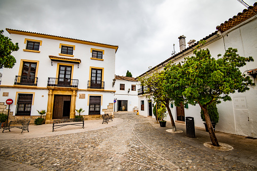 White houses and cobbled alleys in Moorish quarter in Ronda, Spain