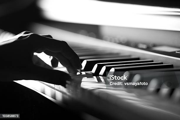 Piano Playing Stock Photo - Download Image Now - Black And White, Piano, Musician