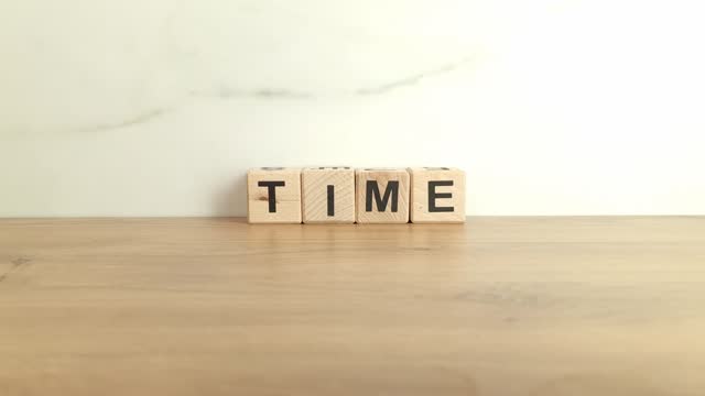 Word time made from wooden blocks