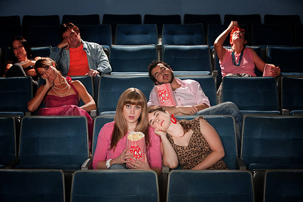 Bored People In Theater stock photo