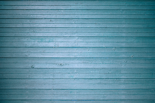 Texture background of old wooden grunge plank light blue turquoise, full frame