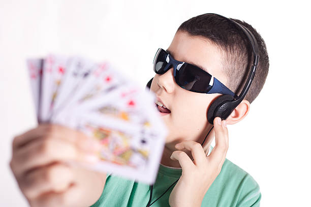 Teen playing cards stock photo