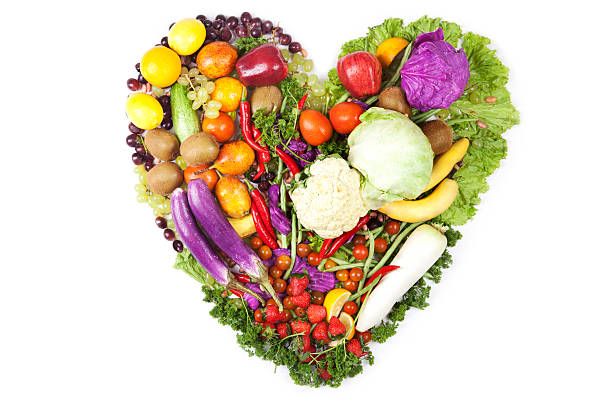 istock Fruits and vegetables arranged in a heart shape 155865691