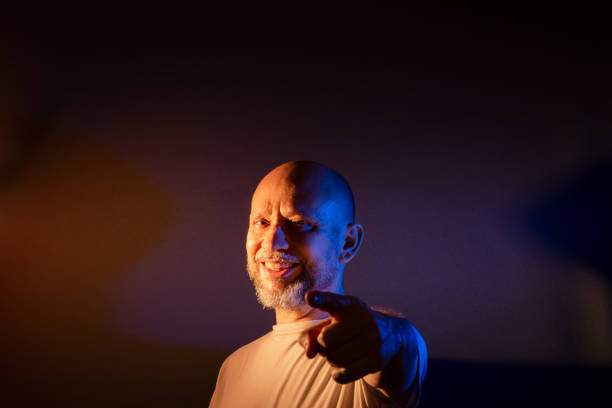 istock Funny bearded bald man doing different expressions and gestures. Happy, smiling a lot. 1558682034