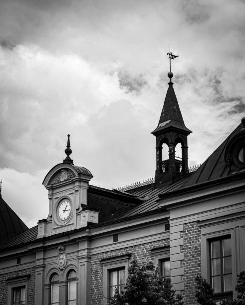istock Low angle view of a building against cloudy sky 1558687265