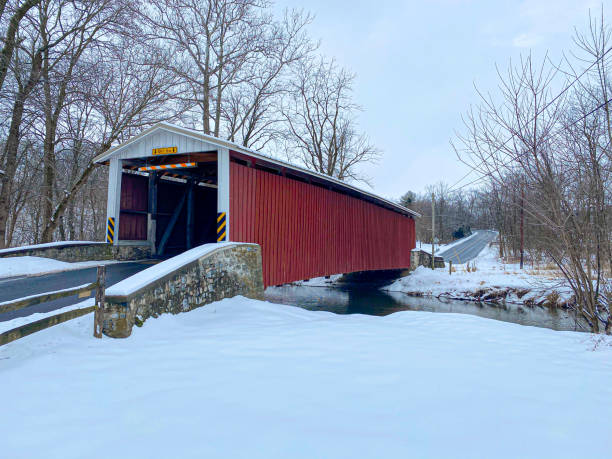 istock Covered Bridge during Christmas season 1558689948