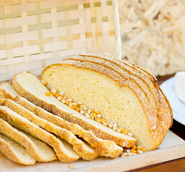 Slices of corn bread Slices of corn bread on the table bread bun corn bread basket stock pictures, royalty-free photos & images