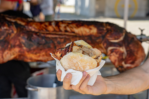 famous traditional portugal pork sandwich called bifana to take away .