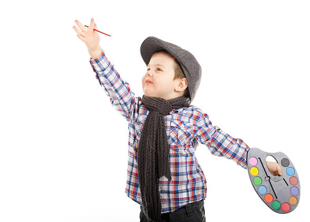istock little boy painting artist 155874795