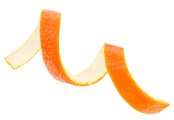 istock Single orange peel isolated on a white background, selective focus. Vitamin C. 1558762518