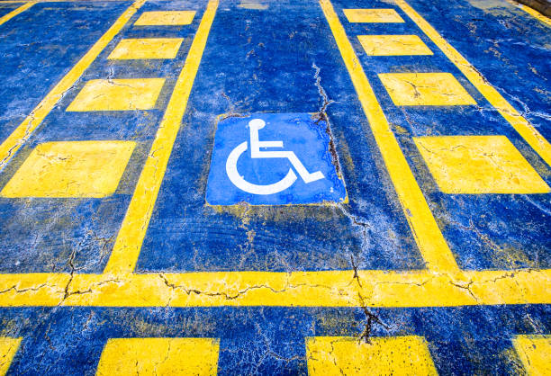 istock typical disabled sign at a street 1558765311