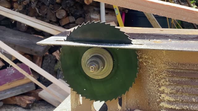 Small compact circular saw spins idle to stop