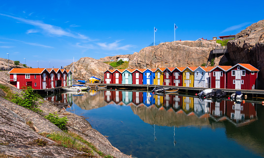 Idyllic colorful fisherman cabins Smogenbryggan in Smogen, Sweden. Typical Swedish wooden house constructions.