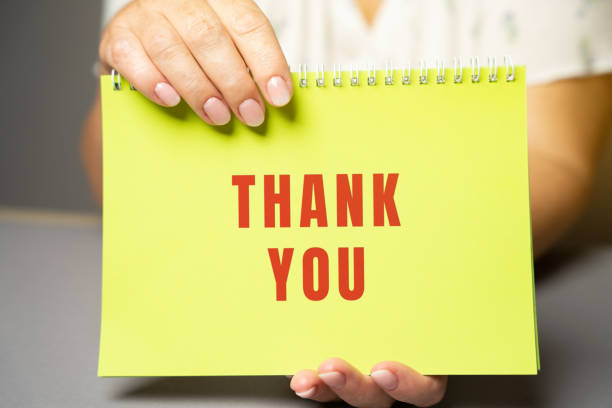 istock Thank you on notes in female hands. Expressing gratitude, acknowledgment or appreciation concept. Gratitude and appreciation. Feedback 1558898749