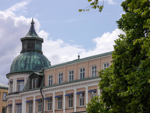 istock Low angle view of buildings against sky 1558960505