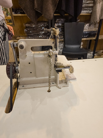 Sewing machine in textile workshop