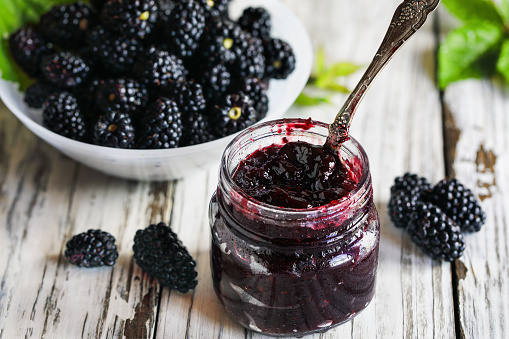 fresh forest fruits:  blueberries, rasberries and blackberries on white background