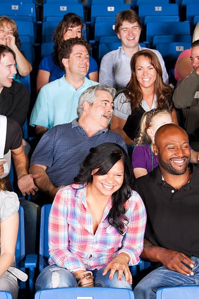 istock Diverse large group of people laughing at exciting game 155903313