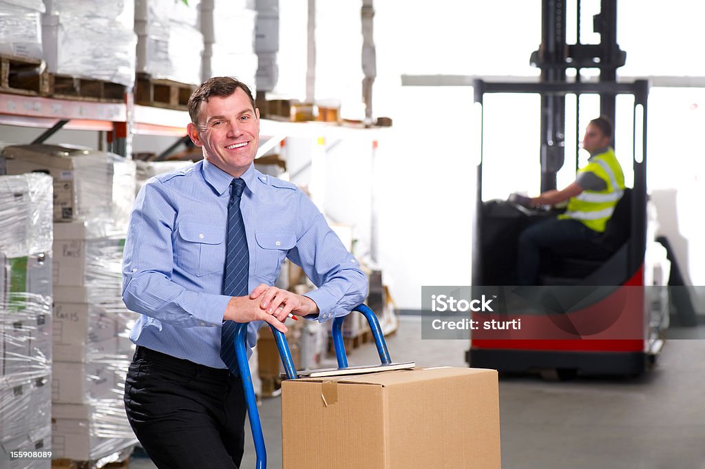 Warehouse Manager mit einer Hand Truck - Lizenzfrei Arbeiter Stock-Foto