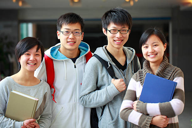 istock portrait of four young college students 155908135