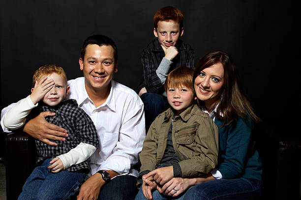 istock nuclear family parents sibling boys 155908657