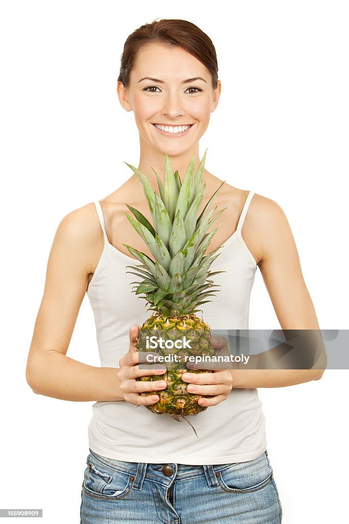 Gesunde sliming und abnehmen. Schöne brunette holding pineappl - Lizenzfrei Abnehmen Stock-Foto