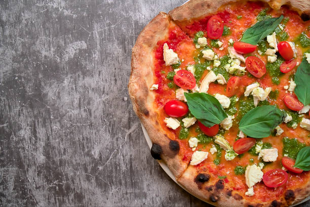 istock Napolitan Pizza Perfection: Tomato, Mozzarella, Basil, Copy Space 1559089719