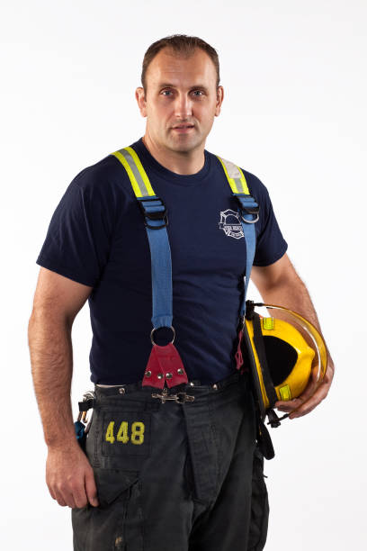 istock Studio shot of a fireman on white background. 155909016