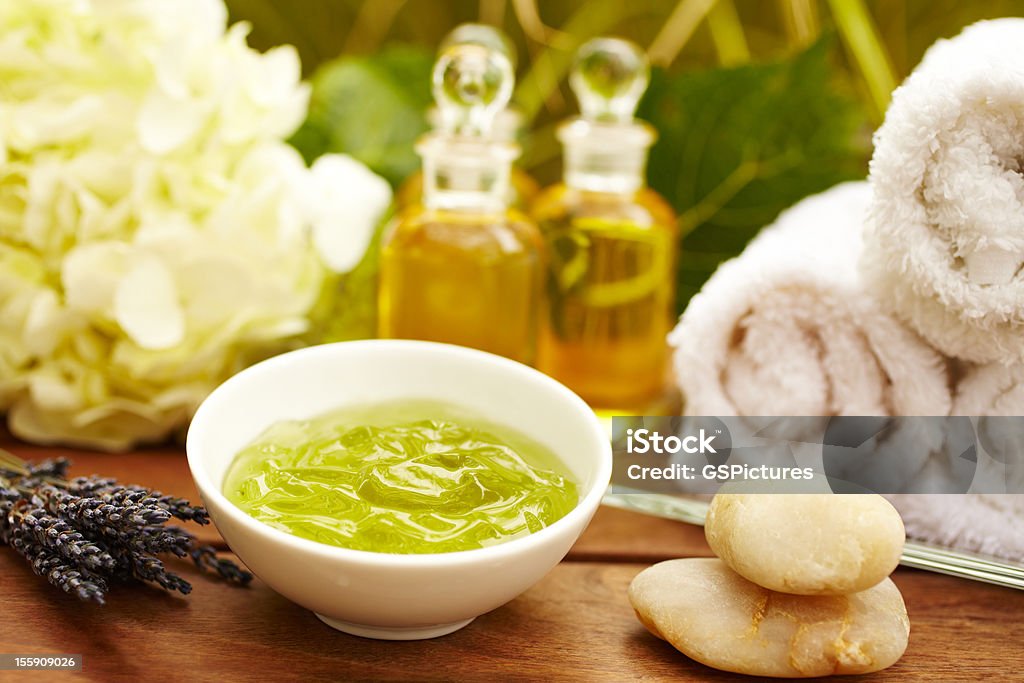 Seaweed Facial product at spa Seaweed facial product at spa with lavender and massage oil Glass - Material Stock Photo