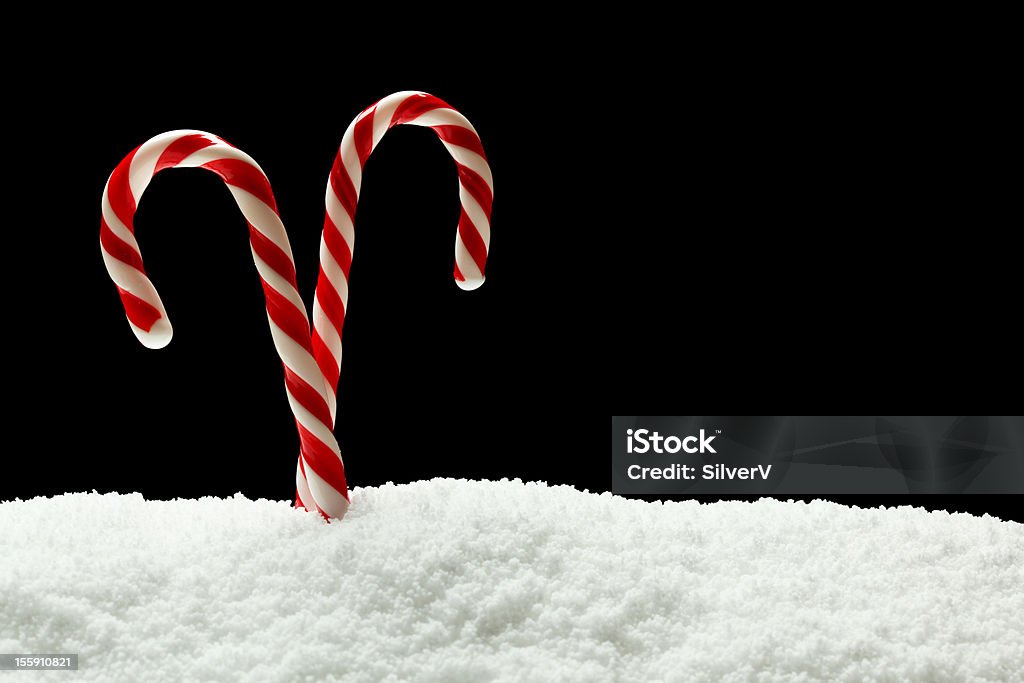 Candycanes dans la neige - Photo de Blanc libre de droits