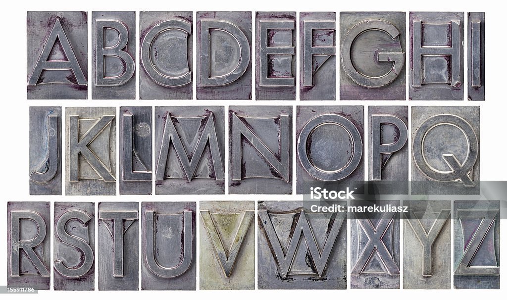 alphabet in grunge metal type English alphabet - a collage of 26 isolated letters in grunge letterpress metal type, scratched and stained by ink Alphabet Stock Photo