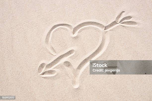 The Broken Heart Stock Photo - Download Image Now - Arrow - Bow and Arrow, Arrow Symbol, Beach