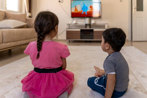 istock Children watching TV. 1559135709