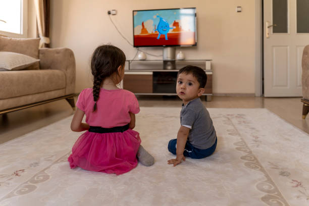 istock Children watching TV. 1559136786