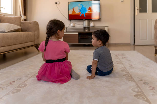 istock Children watching TV. 1559136994