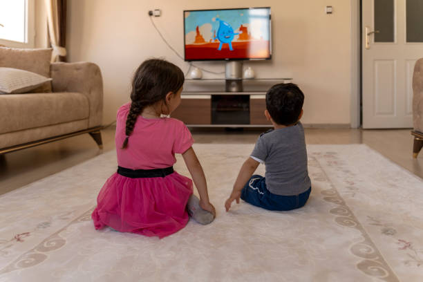 istock Children watching TV. 1559137303
