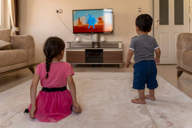 istock Children watching TV. 1559137317