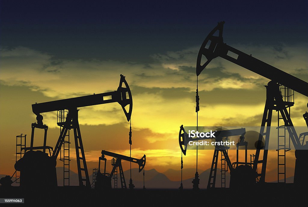 oil field and pump jack pump jack and oil field Oil Well Stock Photo