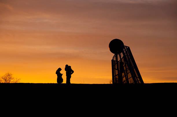istock Sunset and phones 155914237