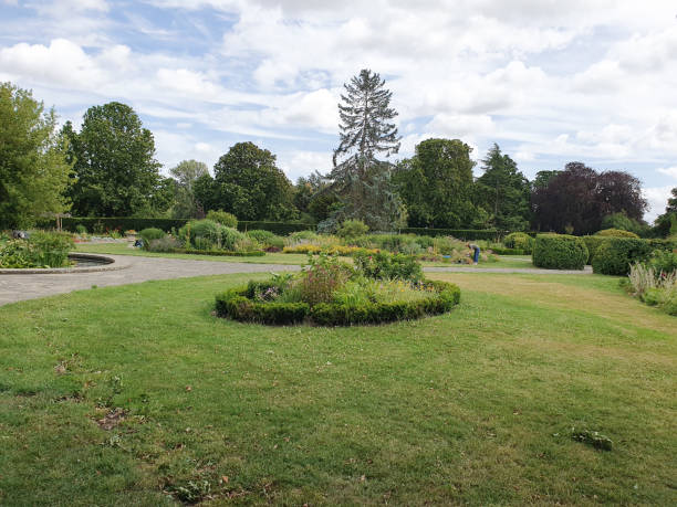 istock A park with a circular garden under the blue sky with sunshine 1559147143