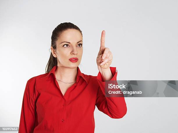 Señalando Foto de stock y más banco de imágenes de Adulto - Adulto, Alzar la mano, Apuntar